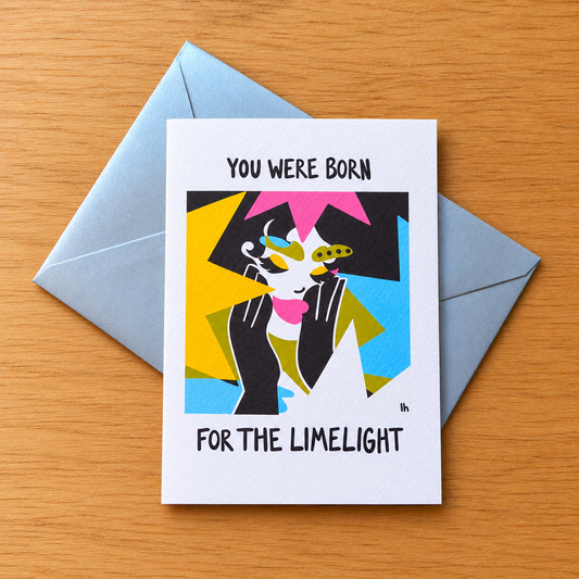 You Were Born for the Limelight greeting card by Lo Harris, styled on a table